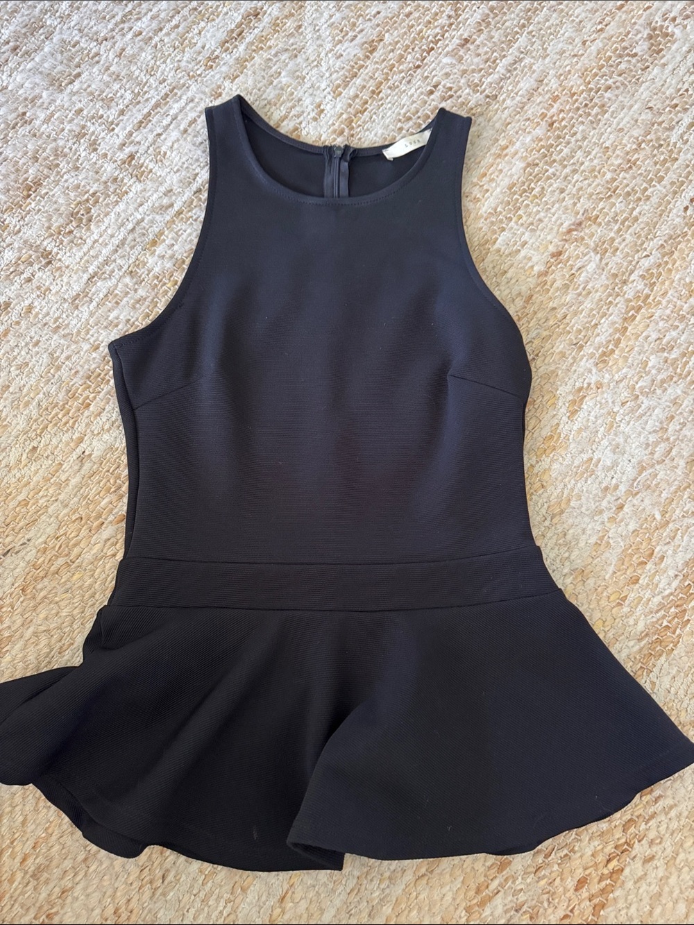 Lush Black Ribbed Sleeveless Peplum Top